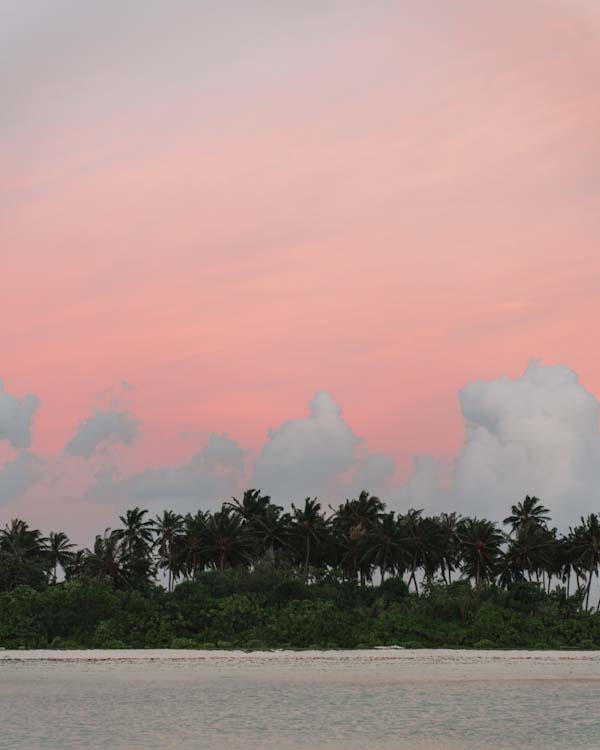 Dhiffushi sunset Maldives local island budget